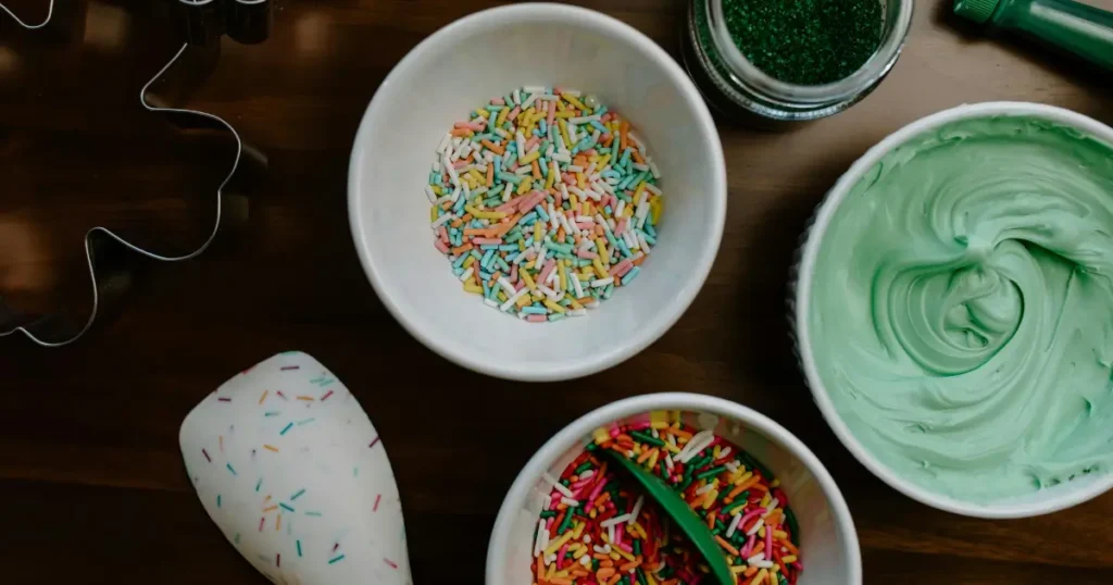 Step-by-step ingredients and tools for making Cookie Monster ice cream.