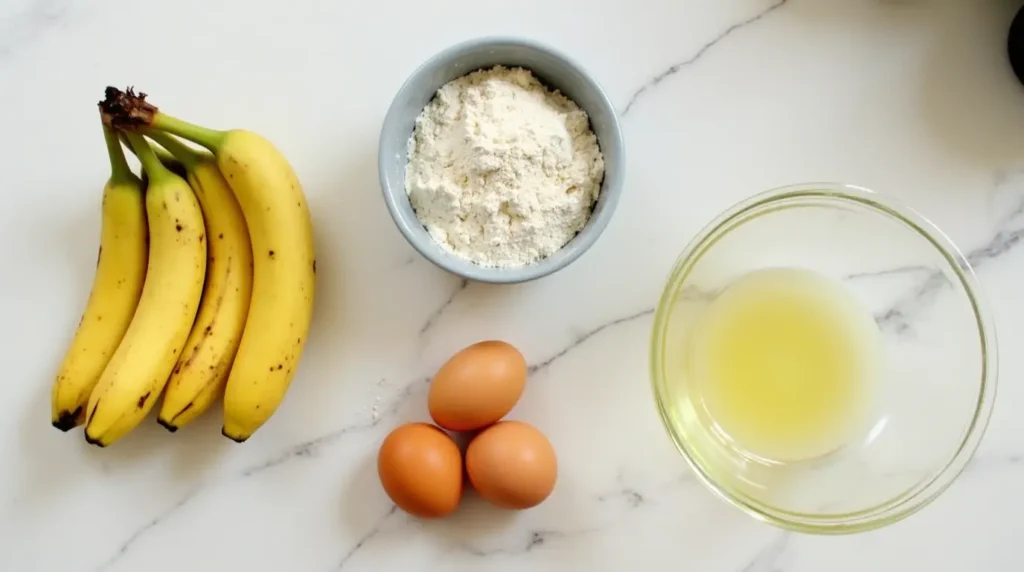 Banana bread ingredients laid out on a kitchen countertop ready to be mixed.